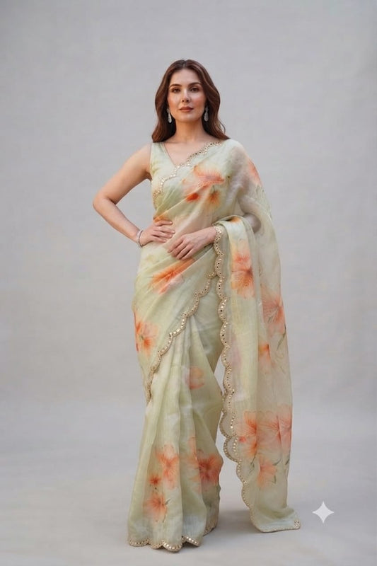 Elegant Pastel Green Floral Organza Saree with Scalloped Mirror-Work Border