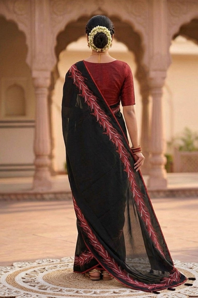 Black georgette plain Saree with boundary enhancing the nature
