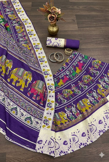 Premium purple silky saree with jari work royal look .