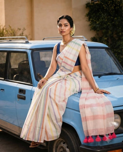 Elegant pastel striped linen saree with tassels perfect for you