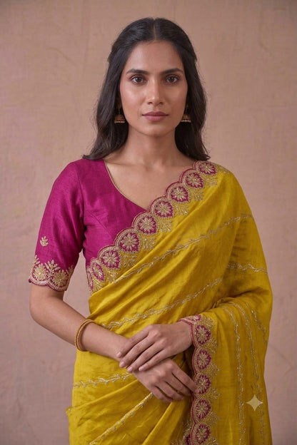 Yellow  chiffon fabric saree with shining texture