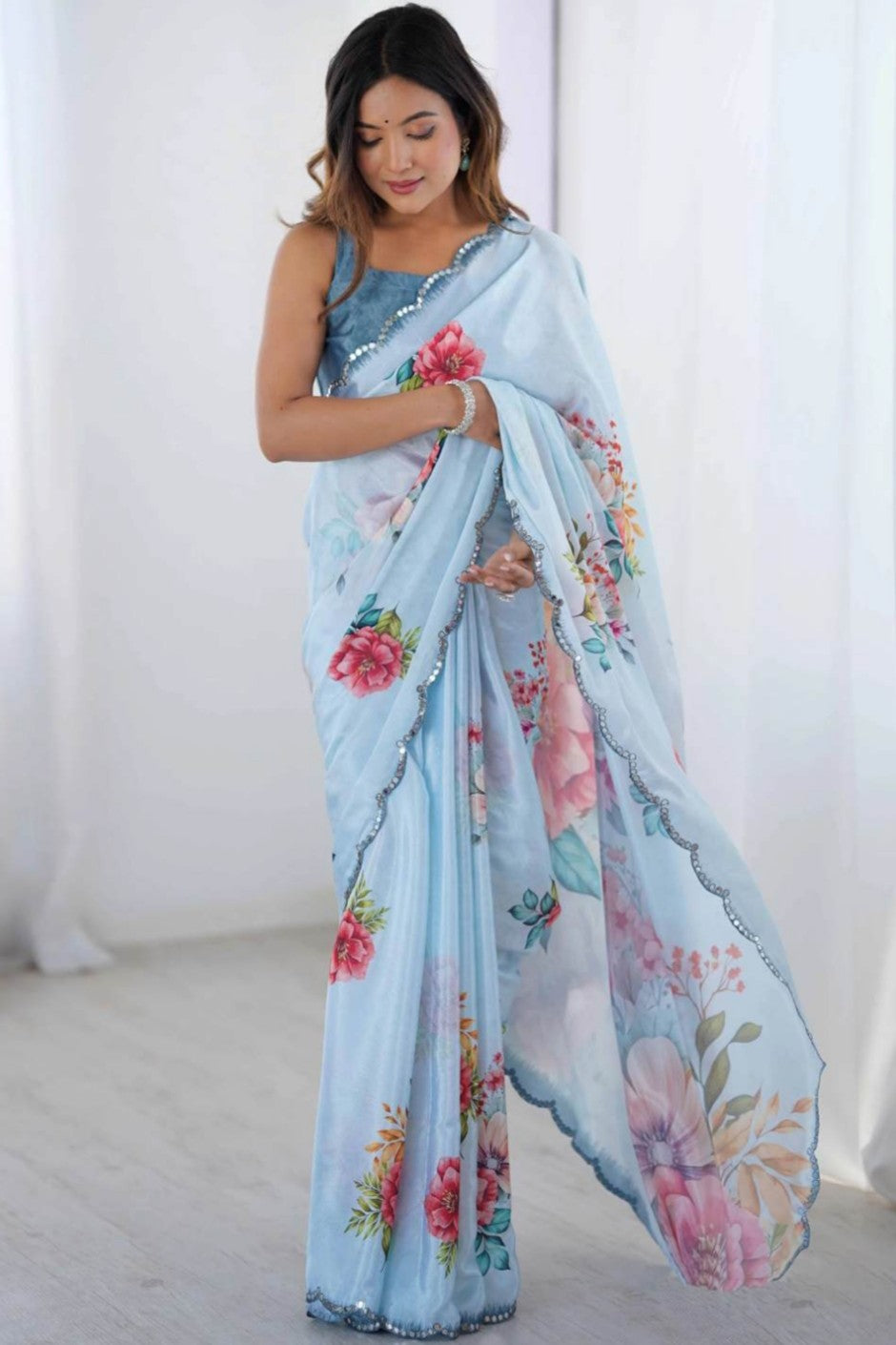 Bluesh georgette printed saree with shining boundary