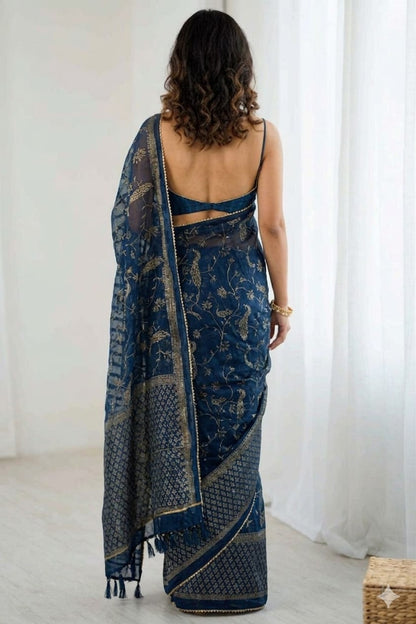 Dark bluesh georgette printed saree with simple border