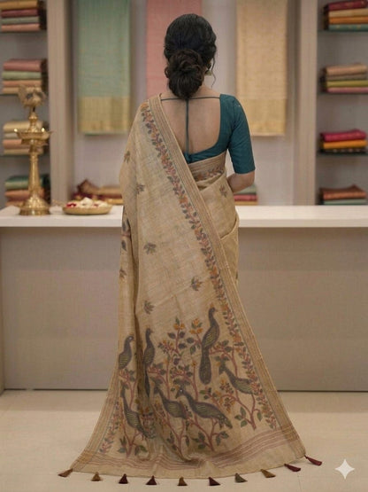 Creamy traditional saree for the beautiful girl alongwith dark green blouse