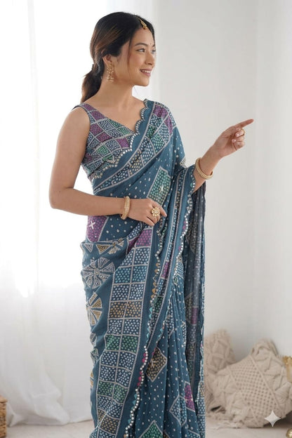 Asmani stylish georgette saree with shining border