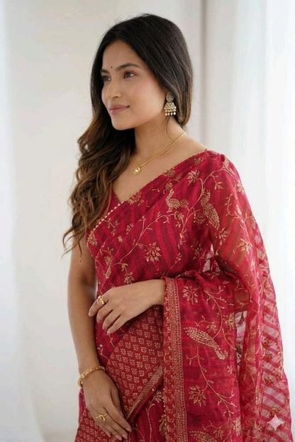 Maroon Georgette with golden jari embroidery work royal look