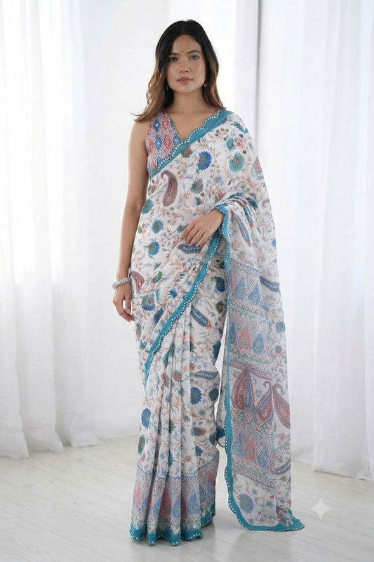 Embrace effortless elegance with this linen blend fabric printed saree