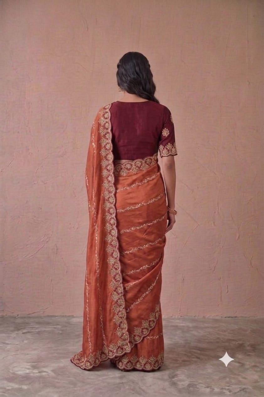 Dark orange colour embroidery design saree