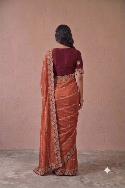Dark orange colour embroidery design saree