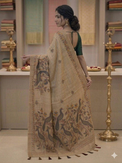 Creamy traditional saree for the beautiful girl alongwith dark green blouse