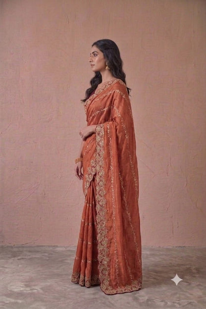 Dark orange colour embroidery design saree