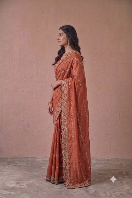 Dark orange colour embroidery design saree