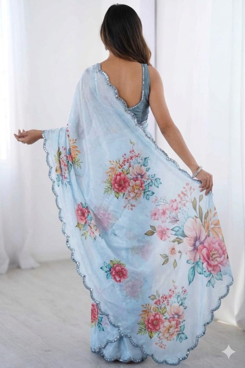 Bluesh georgette printed saree with shining boundary