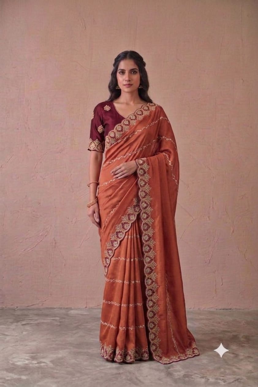Dark orange colour embroidery design saree