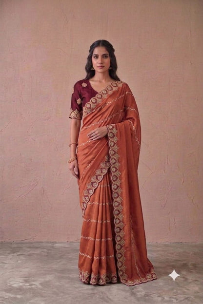 Dark orange colour embroidery design saree