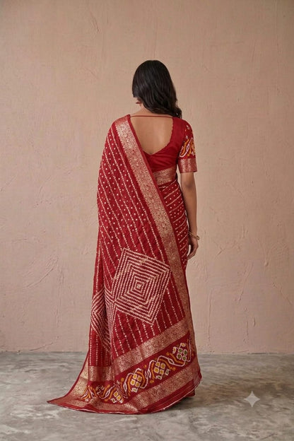 Semi georgette saree with shining border in dark red colour