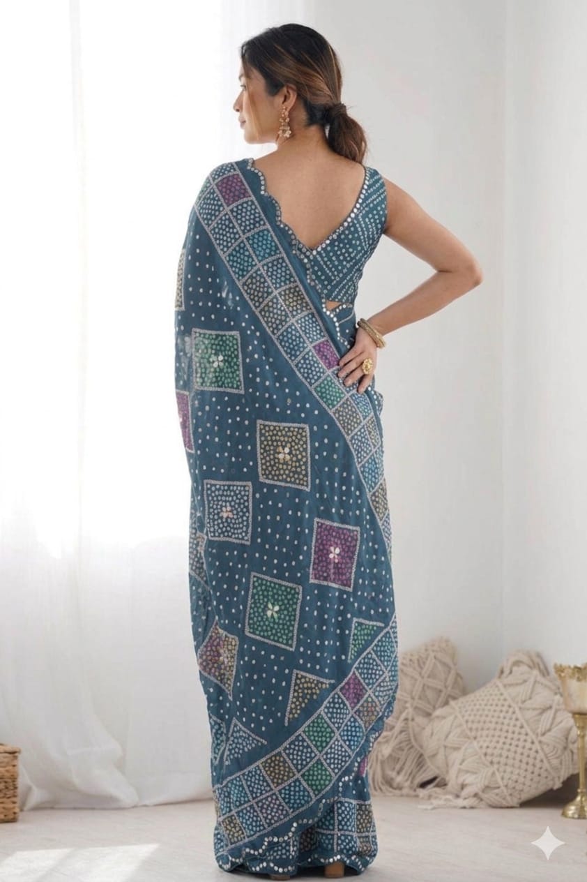 Asmani stylish georgette saree with shining border