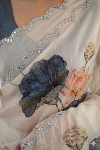Milky white georgette saree with burned flower