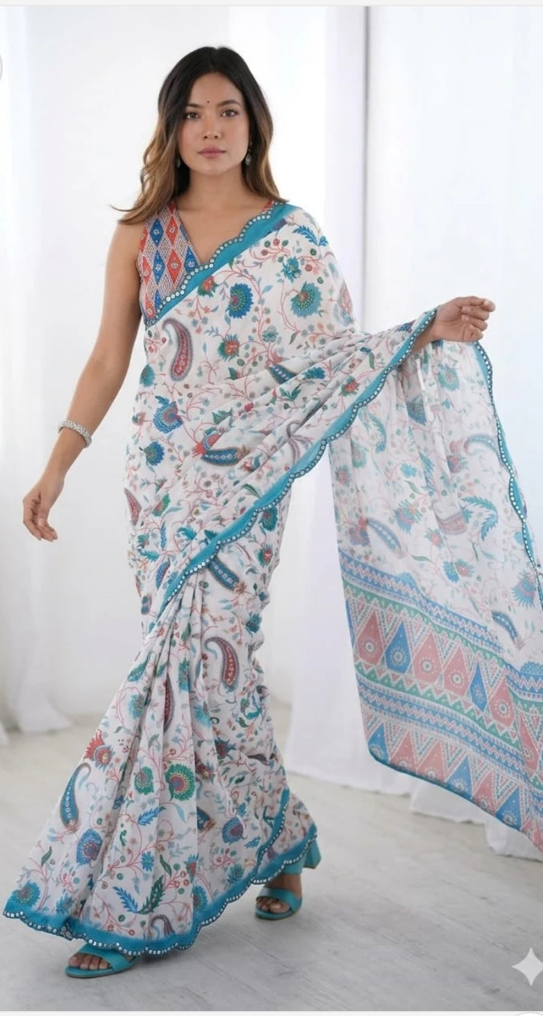 Embrace effortless elegance with this linen blend fabric printed saree