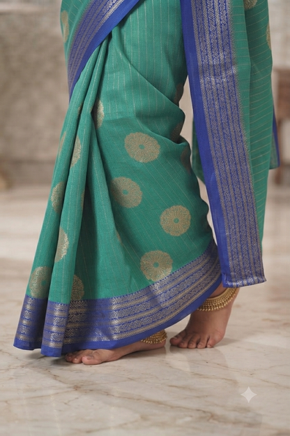 Radiant green floral motif saree with a mixture of silk&cotton