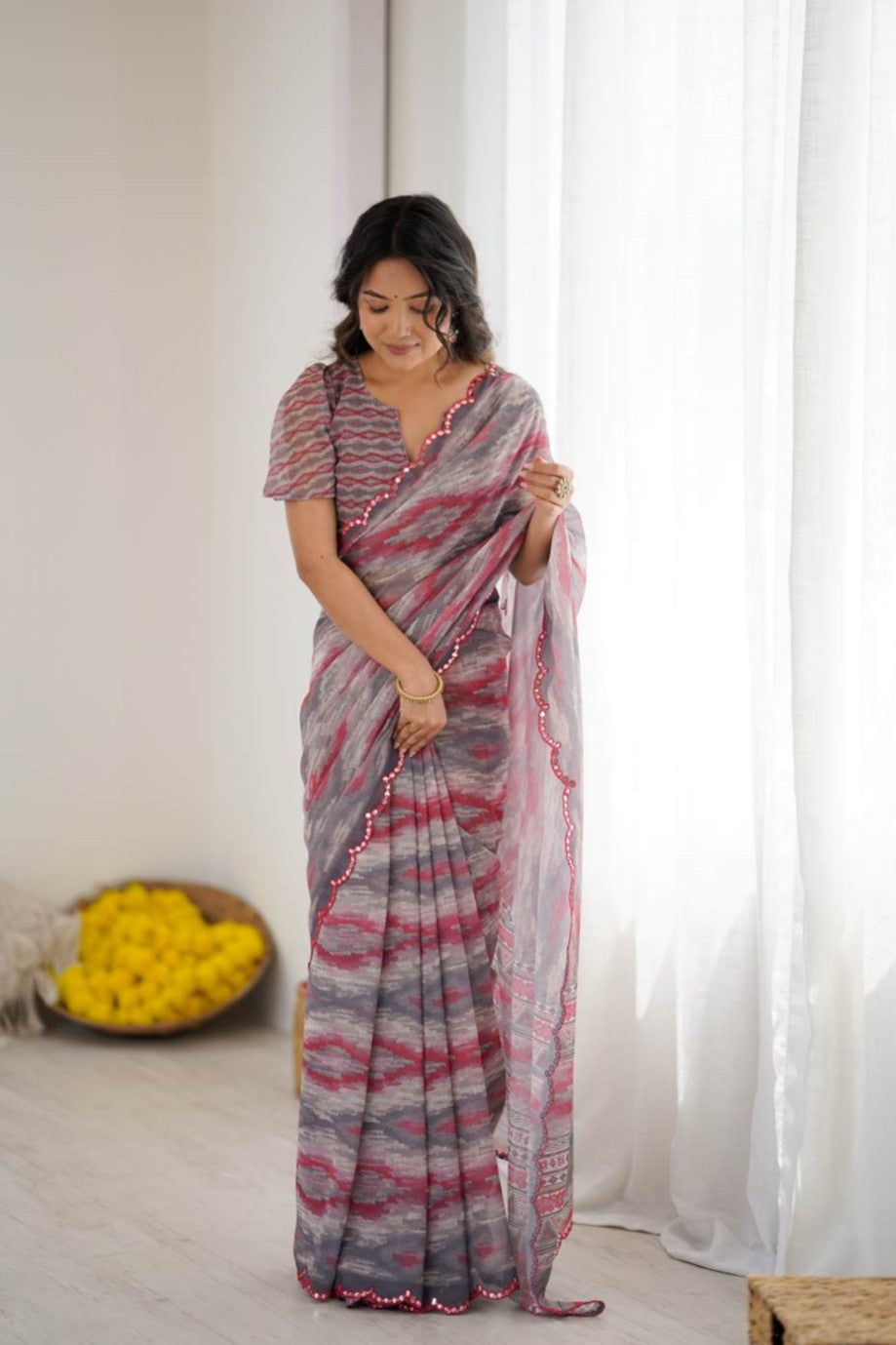 Pinky slate georgette saree with shining border design