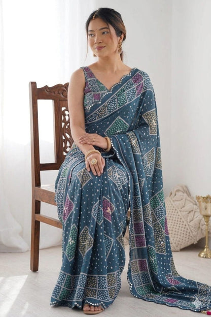 Asmani stylish georgette saree with shining border